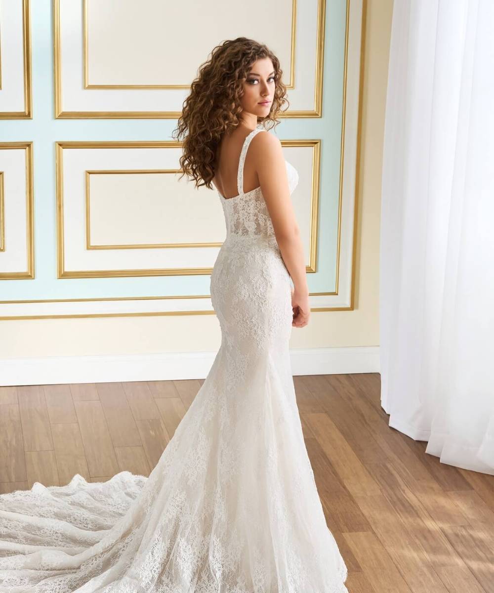 Model wearing a white dress